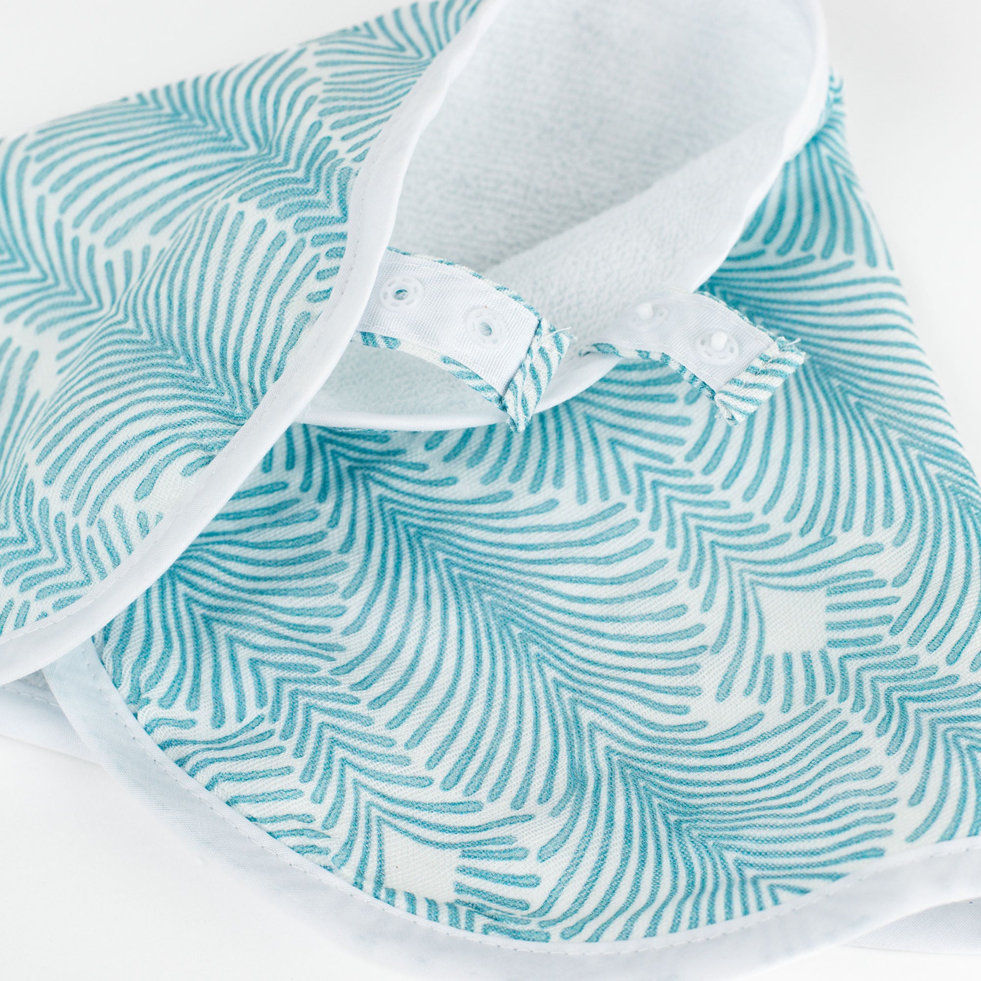 Deco Stripe Bib in Buttery Blue